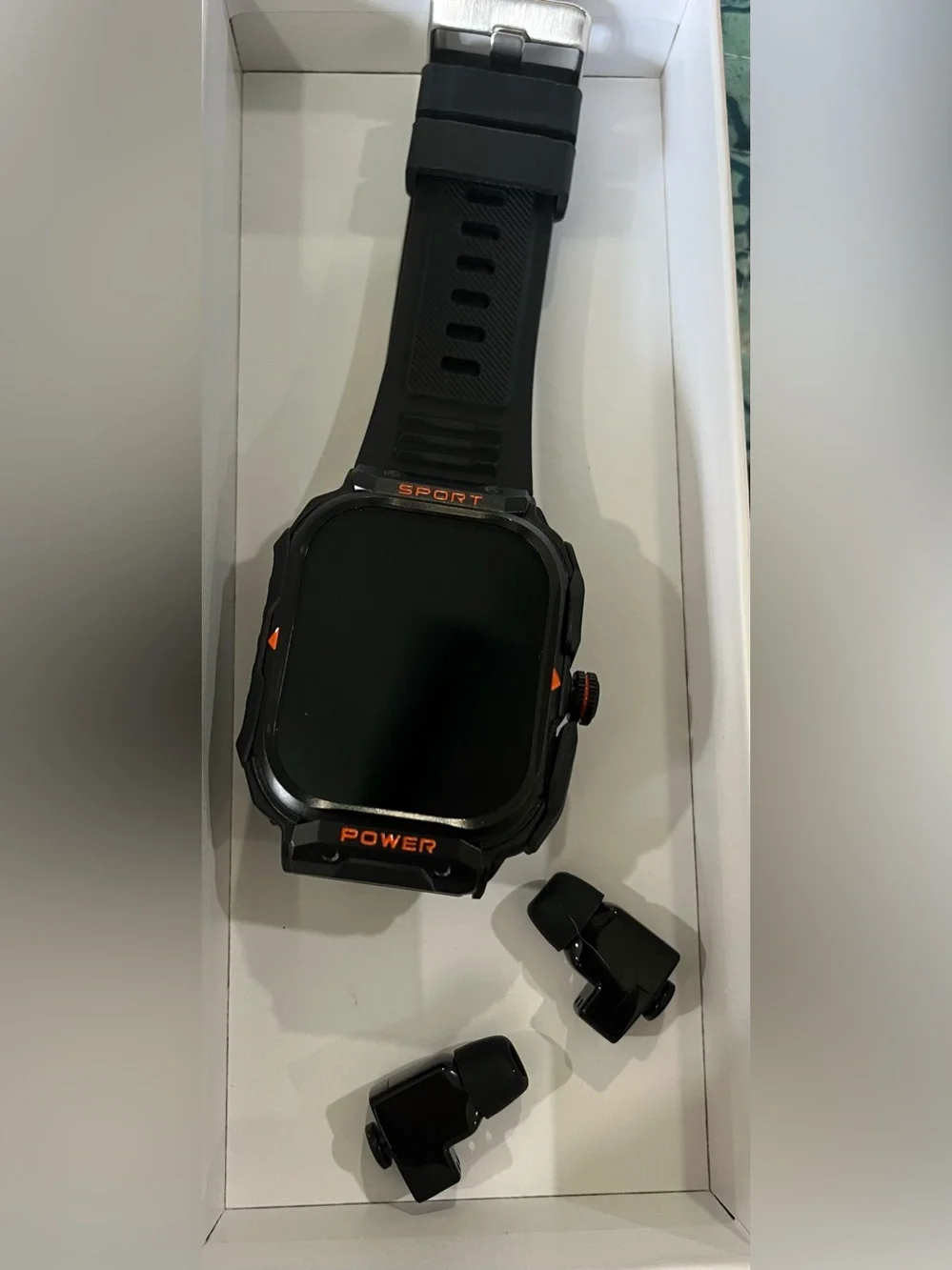 Sport Rugged Smartwatch and earbuds in Black with Orange Accents